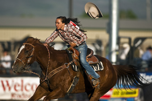 Chris Detrick  |  The Salt Lake Tribune 
Katelyn Badham, of West Millard, competes in the barrel-racing competition during the Utah High School Finals Rodeo at the Wasatch County Special Event Center on Friday.