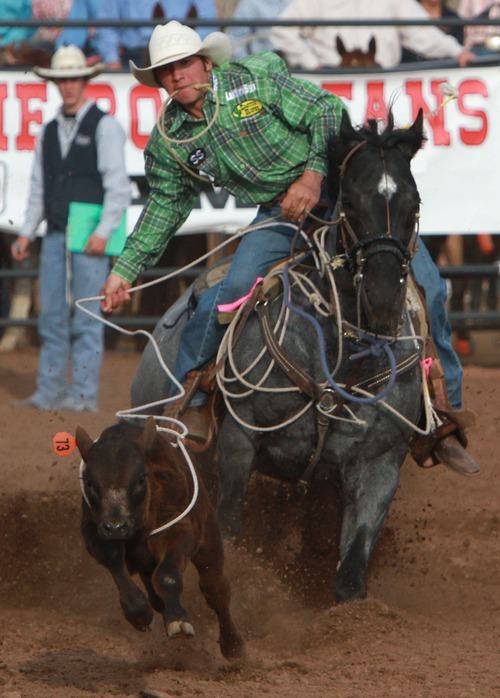 Rick Egan l The Salt Lake Tribune

Quinn Kesler, Sevier, competes in the Tye Down competition at the Utah High School Rodeo Championship round in Heber City, Saturday, June 10, 2011.