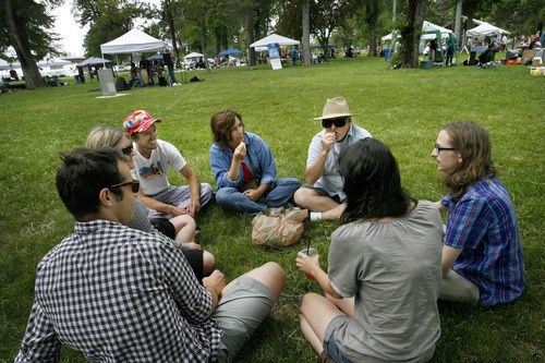 Scott Sommerdorf  |  The Salt Lake Tribune
Friends talk in a circle on the grass at the first day of the sixth annual Salt Lake People's Market held at Jordan Park, 1060 S. 900 West, Salt Lake City, Sunday, June 12, 2011.