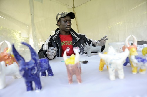 File photo  |  The Salt Lake Tribune

Dominic Raimondi, of Salt Lake City, makes a Sudanese clay bull at the first day of the Living Traditions Festival in May in downtown Salt Lake City. Raimondi started making the bulls as a child in Sudan. The annual festival celebrates the city's folk and ethnic arts through performance, food and crafts.