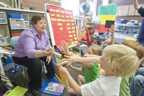 Paul Fraughton  |  The Salt Lake Tribune  Carolyn Zaugg, a kindergatren teacher at Salt Lake City's Hawthorne Elementary, interacts Tuesday with her last  group of students, as she is retiring after 28 years  of teaching.