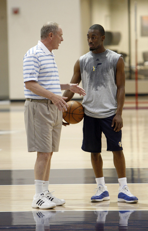 Francisco Kjolseth  |  The Salt Lake Tribune
Utah Jazz general manager Kevin O'Connor speaks with Connecticut guard Kemba Walker after finishing a workout with the Utah Jazz on Wednesday, June 15, 2011, at their practice facility in Salt Lake City.