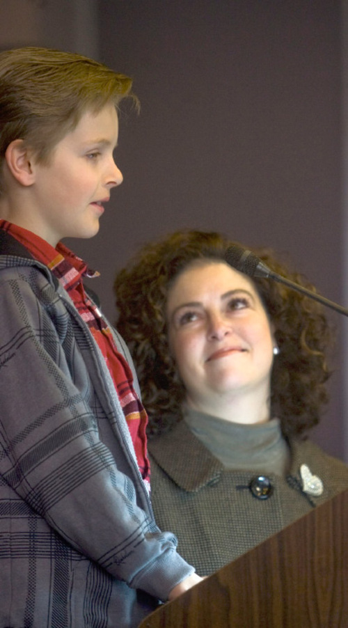 Tribune file photo
Allyson Gamble, pictured here in 2007 with her son, was diagnosed with PPCM when she was pregnant. A Utah study found a genetic link for the disease.
