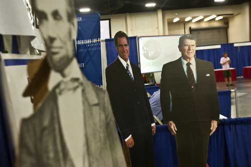 Chris Detrick  |  The Salt Lake Tribune 
Cardboard cutouts of Abraham Lincoln, Mitt Romney and Ronald Reagan were at the Utah State Republican Party Convention at the South Towne Expo Center on Saturday.