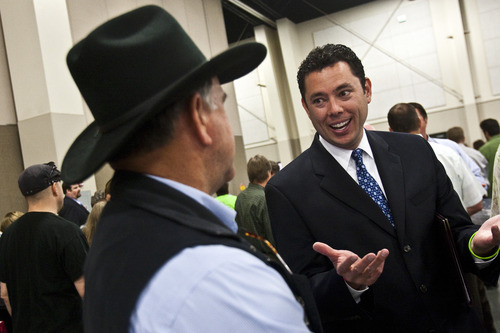 Chris Detrick  |  The Salt Lake Tribune 
Rep. Jason Chaffetz talks to supporter John Long, of American Fork, during the Utah State Republican Party Convention at the South Towne Expo Center on Saturday.