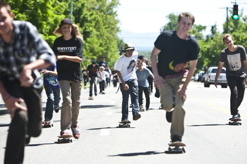 Chris Detrick | The Salt Lake Tribune 
Skateboarders in downtown Salt Lake City take part in National Go Skateboarding Day on Tuesday, June 21, 2011.