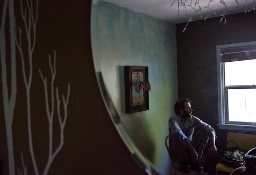 Djamila Grossman  |  The Salt Lake Tribune
Artist Dave Borba poses for a portrait next to his piece, 
