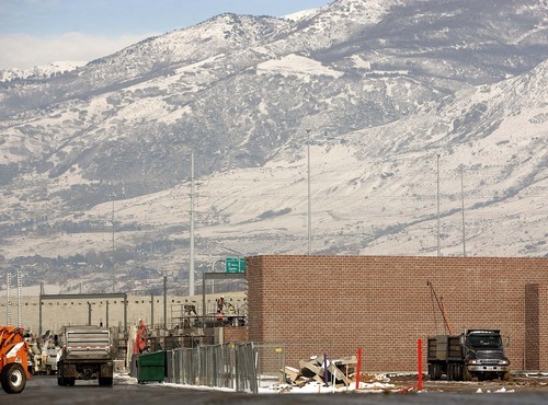 Trent Nelson  |  The Salt Lake Tribune
Harmons grocery store at Farmington's Station Park development under construction in December. The development is located at the intersection of Interstate 15, Legacy Parkway and FrontRunner commuter rail station.