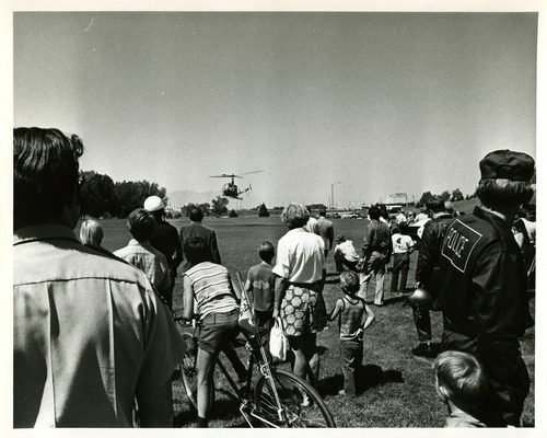 Tribune file photo

Spectators watch a police helicopter take off from a park in 1973.