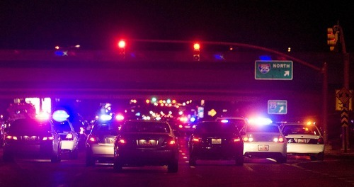 Djamila Grossman  |  The Salt Lake Tribune

Police cars are lined up in the road after an officer-involved shooting at the intersection of 3500 South and Interstate-215 in Salt Lake City, Utah, on Friday, June 24, 2011.
