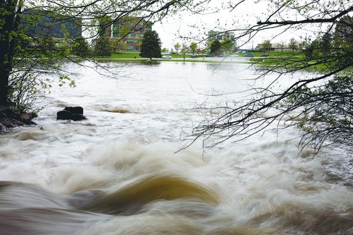 Djamila Grossman  |  The Salt Lake Tribune

High water flows into the pond at Sugarhouse Park in Salt Lake City, Utah, on Sunday, May 8, 2011.