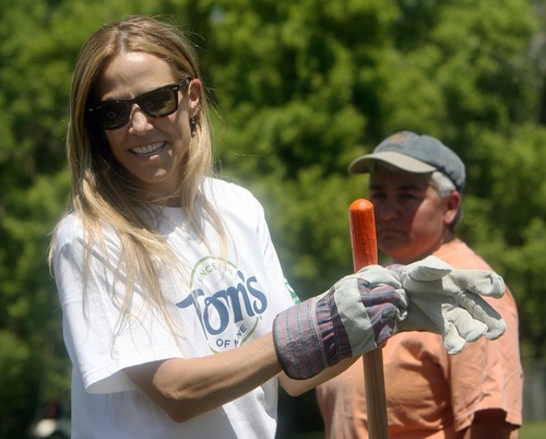 Steve Griffin  |  The Salt Lake Tribune

Pop star Sheryl Crow joins Tree Utah and Tom's of Maine volunteers as they plant trees in Sugarhouse Park in Salt Lake City on Friday, June 24, 2011.