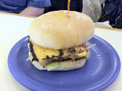 Vince Horiuchi | The Salt Lake Tribune
The 1/4-pound single cheeseburger at Hires is a made with fresh-ground chuck and garnished with lettuce, tomato and American cheese and served on a locally-made bun.