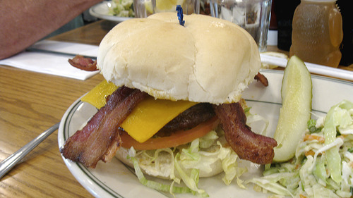 Lesli J. Neilson  | The Salt Lake Tribune

This is just one of the 50 combination burgers to be had at No Worries Cafe & Grill in Summit Park. This burger ($9.15) has 1/3 pound of beef with cheddar cheese, bacon, lettuce, tomato, red onion, pickles and mayonnaise sandwiched between a toasted kaiser bun. A pickle and the choice of French fries, onion rings, coleslaw, soup or green salad comes alongside.