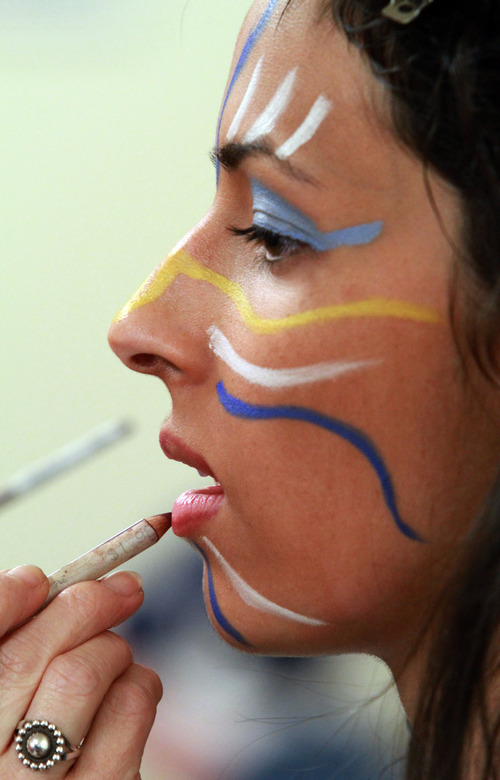 Rick Egan   |  The Salt Lake Tribune

Libby Quijano, 17, Payson, gets her make up on for her part as the wife of King Lamoni, for the dress rehearsal for the Mormon Miracle Pageant, Tuesday, June 14, 2011.