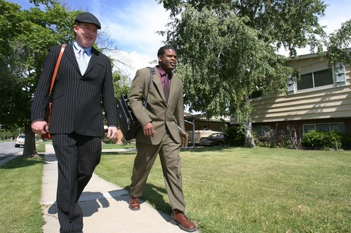 Steve Griffin  |  The Salt Lake Tribune

Jehovah's Witness members Darick Sparks and Quinton Dobbins walk the sidewalks of Bountiful as they go door to door talking with residents Saturday, June 11, 2011.