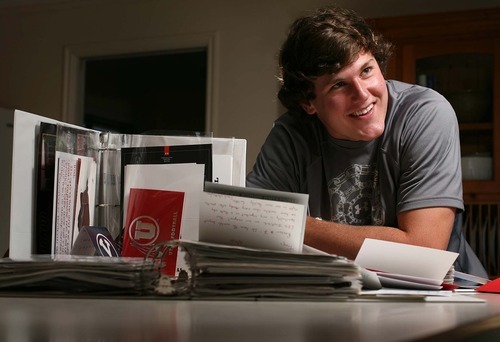 Leah Hogsten  |  The Salt Lake Tribune
Troy Hinds, a defensive end from Davis High School, is the most heavily recruited prospect in the state Friday, June 24 2011 in Kaysville. Hinds shows off his folders full of his awards, letters and memorabilia and serious offers to play for 15 colleges.