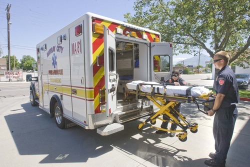 Paul Fraughton  |  The Salt Lake Tribune
Murray City firefighters and paramedics Zac Carney, left, and Joshua Shultz ready their ambulance. Murray started offering its own ambulance service three years ago.