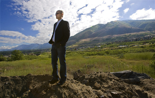 Al Hartmann  |  The Salt Lake Tribune
Draper City Councilman Jeff Stenquist stands in a vacant field near 136000 South and Highland Drive where the city wants to to build a bicycle velodrome on 5 acres of land at the mouth of Corner Canyon.