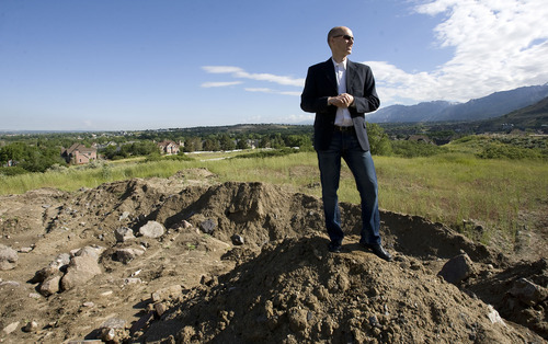 Al Hartmann  |  The Salt Lake Tribune
Draper City Councilman Jeff Stenquist stands in a vacant field near 136000 South and Highland Drive where the city wants to to build a bicycle velodrome on 5 acres of land at the mouth of Corner Canyon.