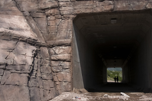 Margaret Distler  |  The Salt Lake Tribune
Alyssa Pettey, 14, and Madelyn Mower, 14, walk through the recently built horse tunnel under 1300 East at Dimple Dell Park on Monday. The tunnel allows mounted horses and pedestrians to safely pass under the road.