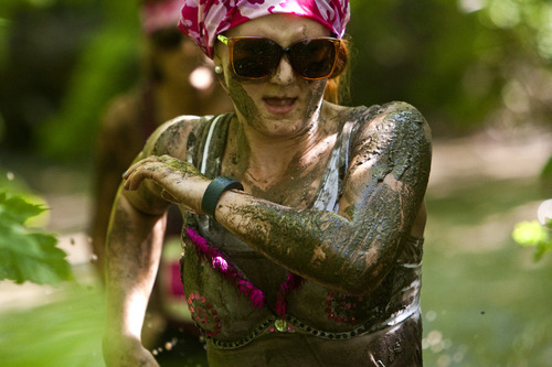 Photo by Chris Detrick | The Salt Lake Tribune 
Women participate in the Kiss Me Dirty Race Series at Wheeler Historic Farm Saturday July 2, 2011.  The four-mile obstacle mud course, was run only by women, who were raising money for gynecological cancer research.