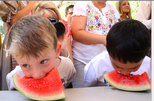 Rick Egan   |  The Salt Lake Tribune

Kids eat watermelon Saturday as they compete for prizes in the watermelon eating contest during the Liberty Days Celebration at This Is The Place Heritage. Festivities included a breakfast, flag ceremony, candy cannon, bucket brigade, watermelon eating contest, tug of war and stick horse races. Liberty Days activities resume at the Heritage Park on Monday.