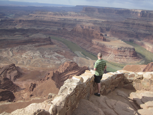 Tom Wharton  |  The Salt Lake Tribune
A tourist enjoys the view from Dead Horse Point State Park near Moab.