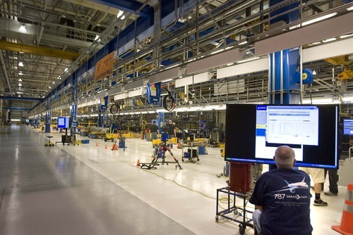 Paul Fraughton  |  The Salt Lake Tribune
Boeing employees begin work on a production line this week that will supply a fin for the 787 Dreamliner.