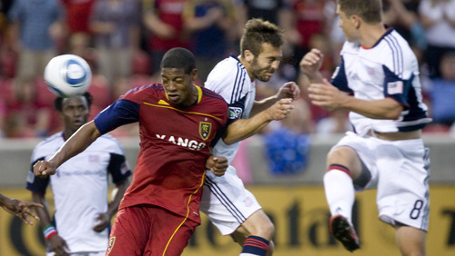 Jeremy Harmon  |  The Salt Lake Tribune

RSL's Chris Schuler tries to keep the ball away from New England defenders as Real Salt Lake hosts the Revolution Monday, July 4, 2011.