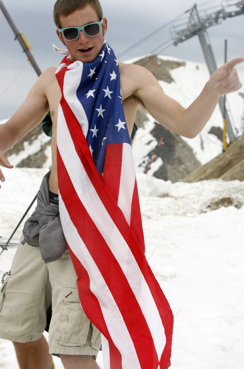 Rick Egan   |  The Salt Lake Tribune

Joe Wall, Salt Lake City wears the flag around his neck as he snowboards, at Snowbird, Monday, July, 4, 2011