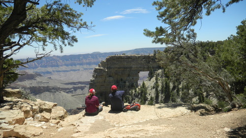 Tom Wharton  |  The Salt Lake Tribune
Hikers sit on some rock and enjoy a view of Angel's Window at the North Rim of Grand Canyon National Park.