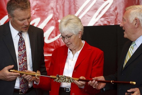 Trent Nelson  |  The Salt Lake Tribune
Greg and Gail Miller examine a Katana sword given to them by Toyota Senior Vice President Don Esmond at the opening of the new Larry H. Miller Toyota/Scion dealership in Murray on Wednesday.