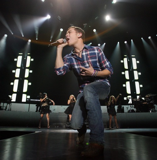 Steve Griffin  |  The Salt Lake Tribune
American Idol winner Scotty McCreery performs at the Maverik Center during the debut of the American Idol nationwide tour in West Valley City on Wednesday.
