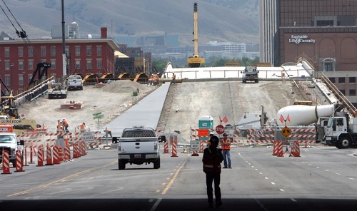 STEVE GRIFFIN  |  The Salt Lake Tribune
Construction continues on the North Temple overpass in downtown Salt Lake City, but the bridge is expected to open next month.
