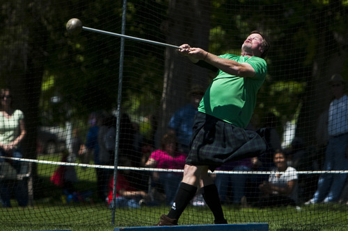 Chris Detrick | The Salt Lake Tribune 
Jeff Loosle, of Draper, throws the 22-pound hammer during the Payson Scottish Festival and Highland Games Saturday. The festival celebrates Scottish heritage and traditions.