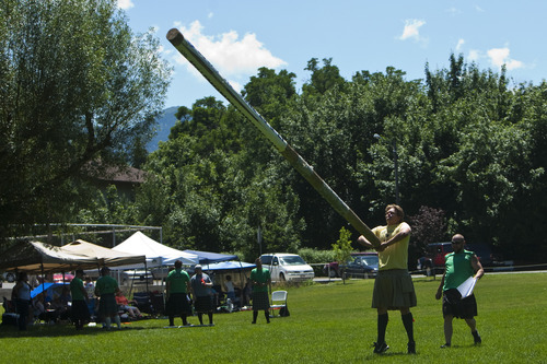 Photo by Chris Detrick | The Salt Lake Tribune 
Joe Hansen, of Sandy, competes in the caber toss during the Payson Scottish Festival and Highland Games on Saturday July 9, 2011. The festival celebrates Scottish heritage and traditions.