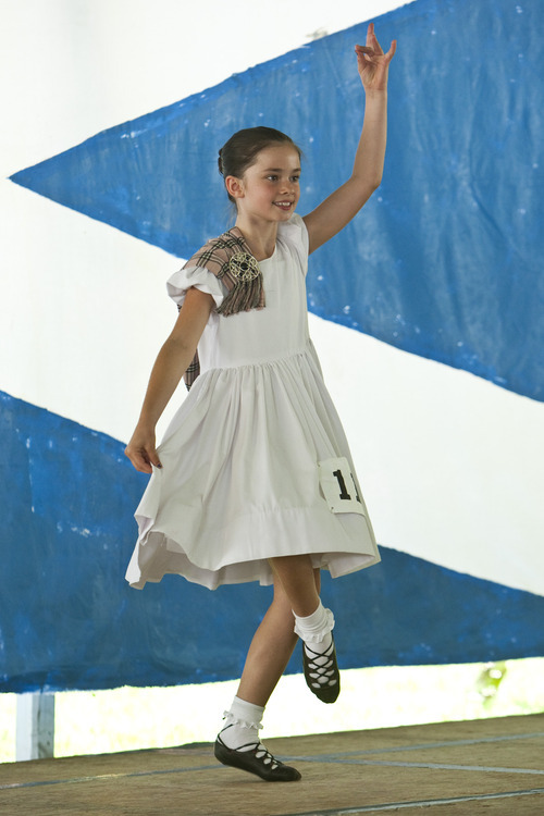 Photo by Chris Detrick | The Salt Lake Tribune 
Kyra Johnson, of Orem, dances the Lilt during the Payson Scottish Festival and Highland Games on Saturday July 9, 2011. The festival celebrates Scottish heritage and traditions.