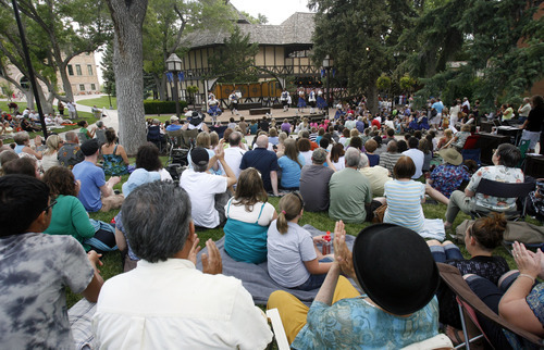 Rick Egan   |  The Salt Lake Tribune

Crowds gather on the grass of Southern Utah University in Cedar City to watch the Greenshow, Thursday, July 7, 2011. The Greenshow takes place every evening at 7 as part of the Utah Shakespeare Festival; it is free.