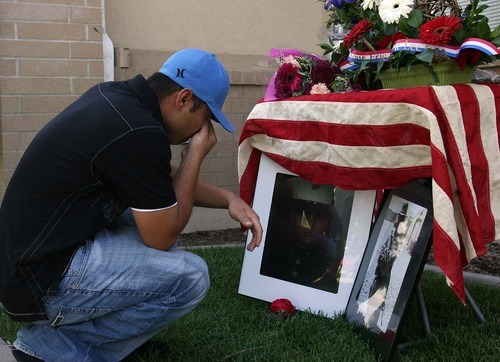 Leah Hogsten  |  The Salt Lake Tribune
Nelson Lopez weeps for the loss of his friend Norberto Mendez Hernandez, of Logan, who was killed Sunday in Afghanistan. Friends, family and loved ones of Mendez Hernandez, 22, held a vigil Tuesday in Logan at the home of his parents.