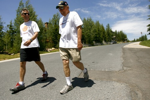 Chris Detrick  |  Tribune file photo
Jon Huntsman Sr. and his namesake son walk at the Deer Valley Resort, near Park City, Utah, in this 2007 photo.