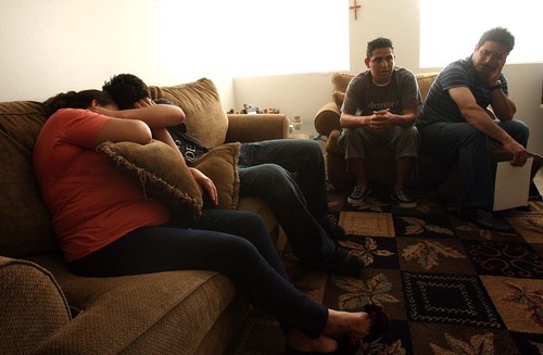 Leah Hogsten  |  The Salt Lake Tribune
Maria Mendez Hernandez is comforted by her son Thomas, as she and her husband Norberto Mendez, right, talk about their son Norberto Hernandez with interpreter and close friend Carlos Rosales, center.