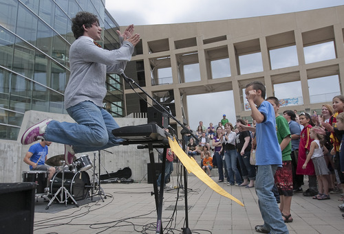 Margaret Distler  |  The Salt Lake Tribune

Harry and the Potters band member, Joe DeGeorge, jumps during their concert in Library Square on Wednesday, June 29, 2011. DeGeorge and his older brother, Paul, created the band based on the popular Harry Potter book series in 2002.