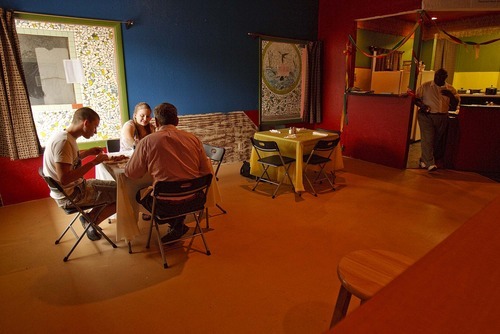 Trent Nelson  |  The Salt Lake Tribune
Sam, Michelle and Eldad Vered eating at Edo Kitchen, a Nigerian restaurant in Salt Lake City.