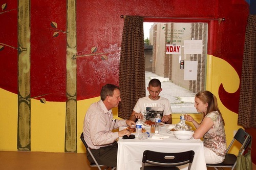 Trent Nelson  |  The Salt Lake Tribune
Eldad, Sam and Michelle Vered eating at Edo Kitchen, a Nigerian restaurant in Salt Lake City.