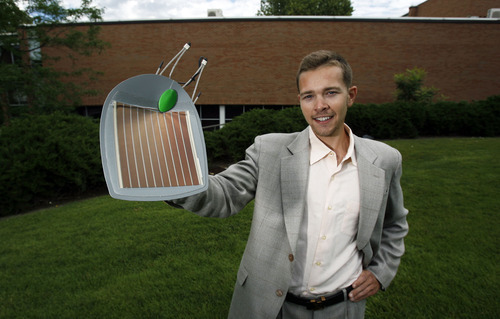 Francisco Kjolseth  |  The Salt Lake Tribune
Tom Melburn, one of several U. students who won sustainability grants from a student fund that pays for on-campus conservation projects, holds up a solar panel leaf. His proposal of covering the south wall of Orson Spencer Hall with solar panels that replicates the look of ivy is scheduled to be installed in the fall.