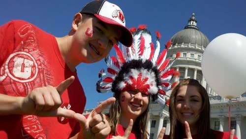 Scott Sommerdorf | The Salt Lake Tribune
Harrison Pierce, left, Haylee Pierce and Julia Pierce celebrate at the state Capitol on Friday as the University of Utah officially becomes a member of the Pac 12.