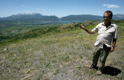 Steve Griffin  |  The Salt Lake Tribune
Developer Tim Charlwood stands on the property where a proposed development is planned near Huntsville.