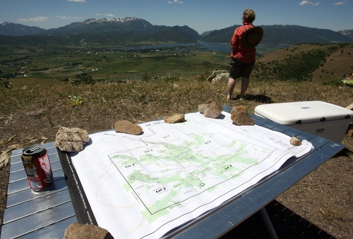 Steve Griffin  |  The Salt Lake Tribune
A map of a proposed development above Huntsville rests on a table during an open house on the property near Huntsville.