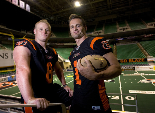 Al Hartmann   |  The Salt Lake Tribune 
Brothers Jason, left, and Aaron Boone play for the Utah Blaze.   They grew up together in Fillmore where they both played high school football.